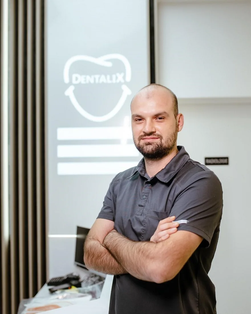 Dr. Banu Marius, Owner & Medic Specialist Stomatologie Generală cu competență în Implantologie și Estetică dentară · competențe în chirurgie stomatologică și maxilo-facială